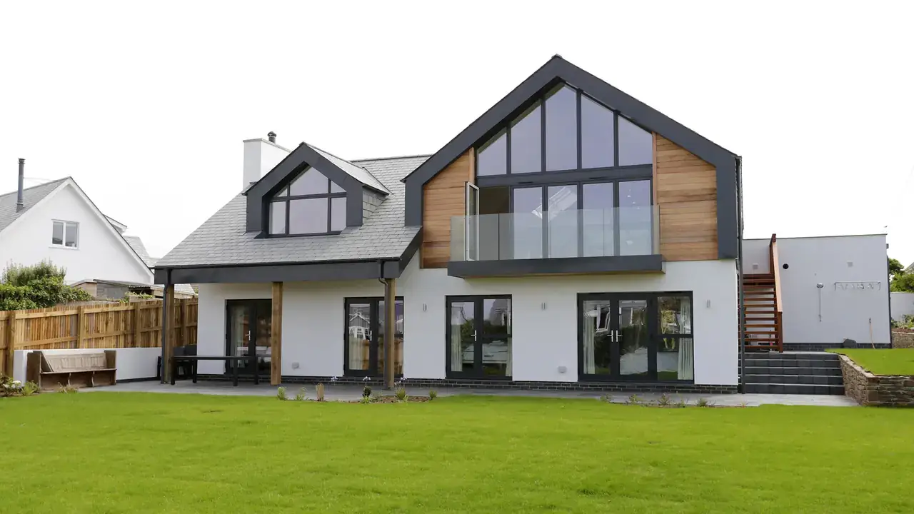 Blue Seas, Constantine Bay, Cornwall — A contemporary timber-frame house delivered for owners who lived away from the site.