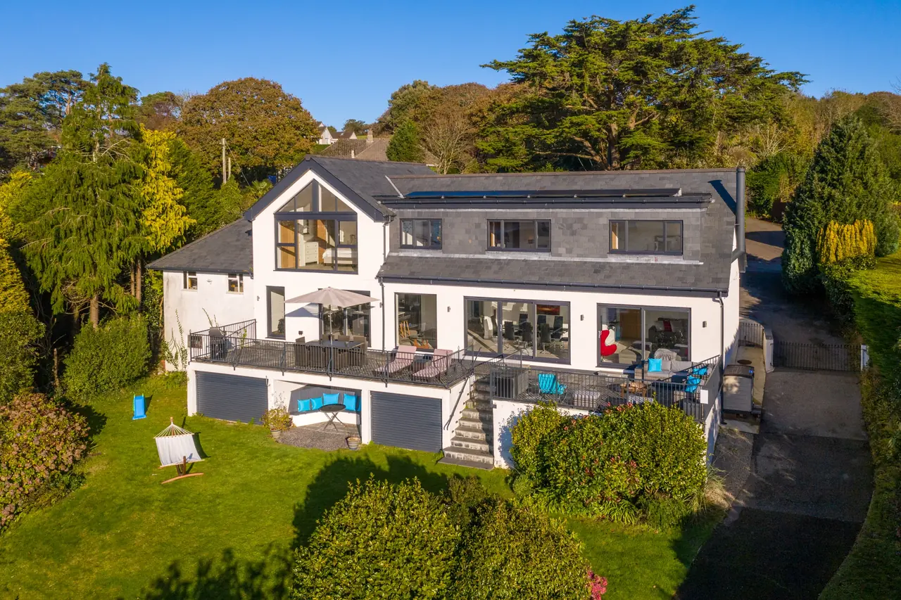 Morvoren, Feock, Cornwall — A substantial estuary-side home delivered on an evolving brief and a firm budget.
