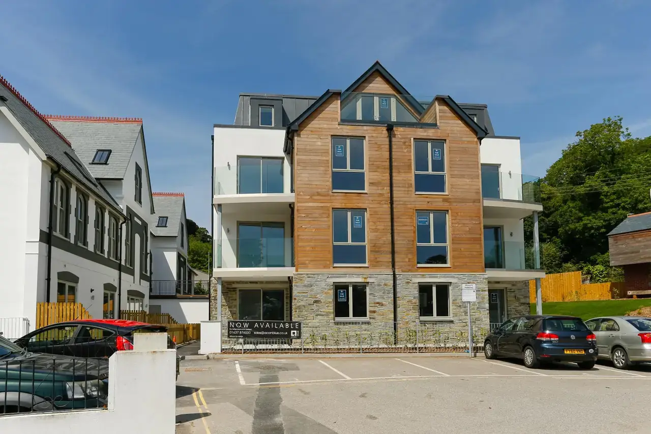 The Old Station Master's House, Fowey, Cornwall — A historic stone building converted and extended into apartments above Fowey harbour.