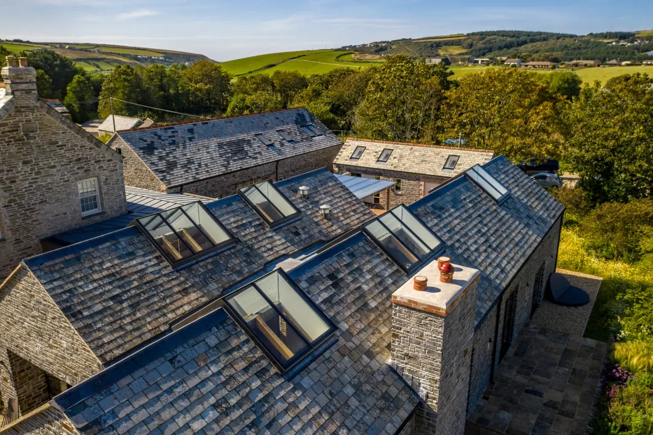 Polgreen Manor, slate roofs and rooflights joining old and new buildings